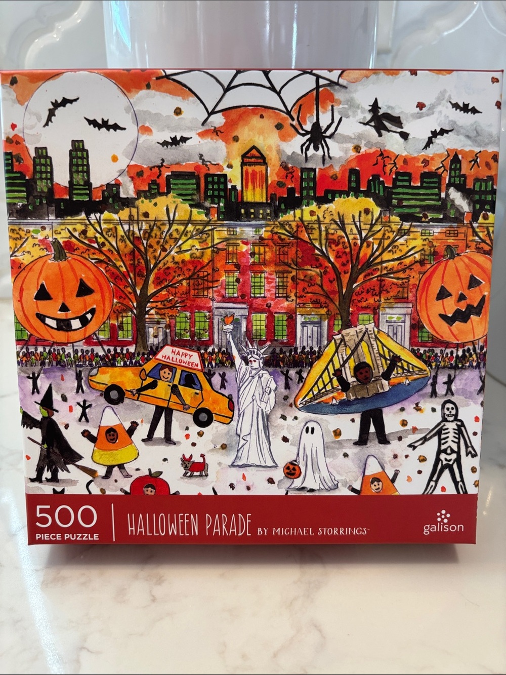 Galison Halloween Parade 500-Piece Puzzle — Orange Holiday Illustration